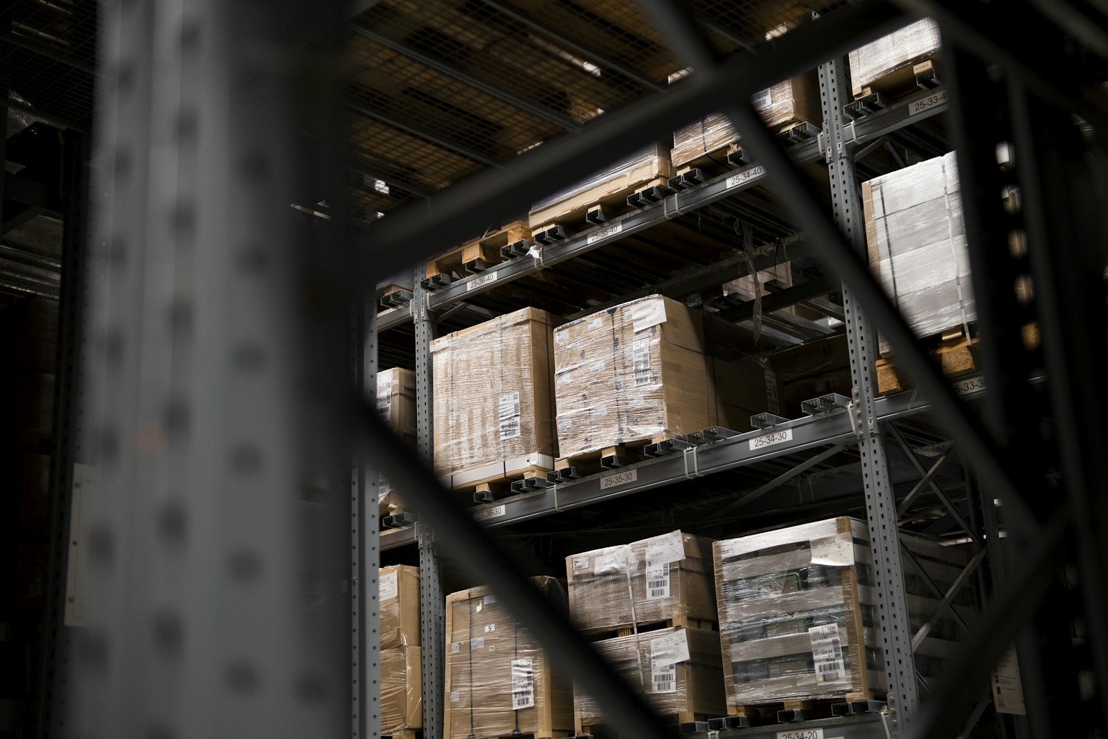 Warehouse racks stacked with cartons
